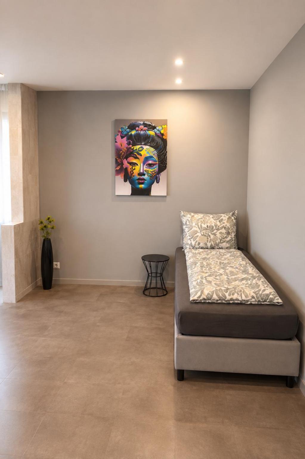Schlafbereich mit Einzelbett – Altstadt Living Deluxe